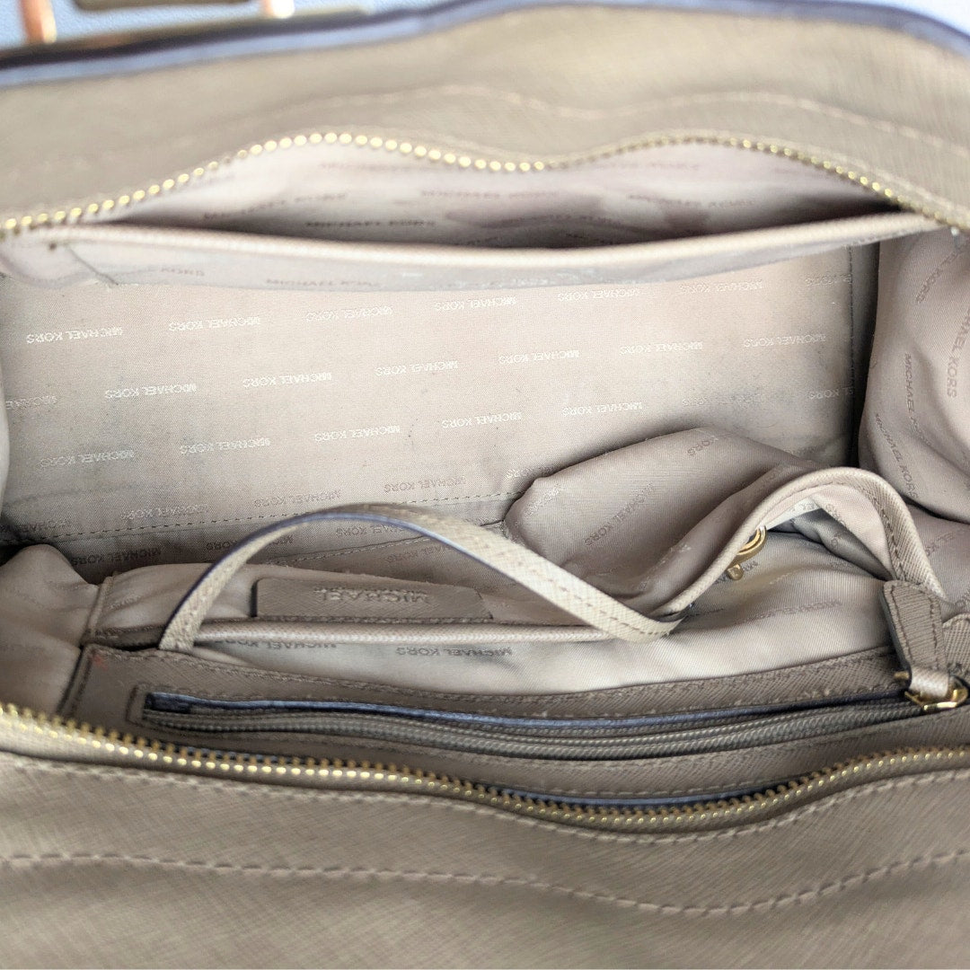 The interior of the Michael Kors Quinn Large Saffiano Leather Satchel.