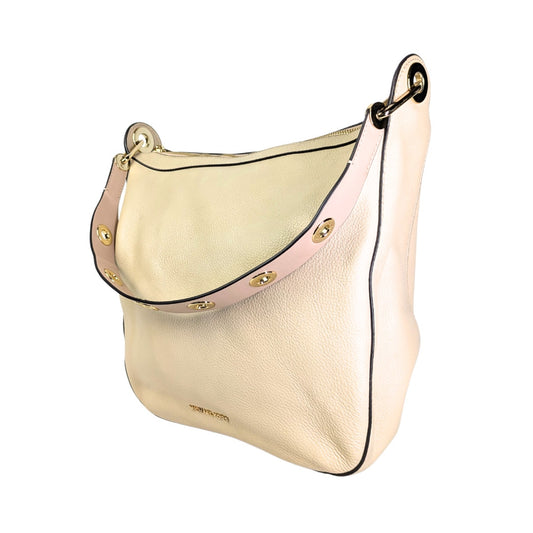 A Michael Kors Raven Large Leather Shoulder Bag in beige pebbled leather with gold-tone hardware and a pink shoulder strap.