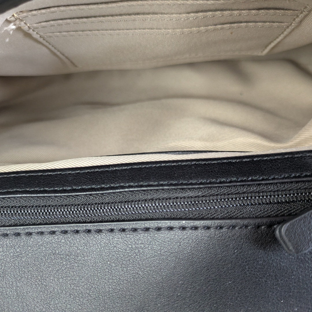 The inside of the Nine West Bedford Animal Print Chain Strap Shoulder Bag.