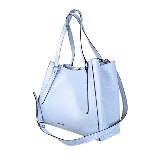 A pre-loved Nine West two-way tote bag in baby blue with a crossbody strap, made with faux leather material, featuring dual shoulder straps, silver hardware, and a magnetic clip.