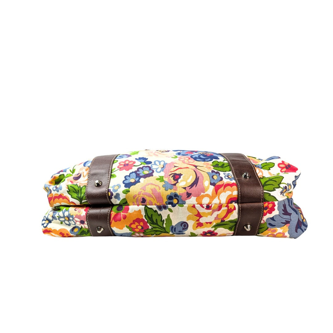 Pre-owned Giani Bernini Floral Print Canvas Diper Bag/ Travel Bag/ Duffle Bag photographed from the bottom.
