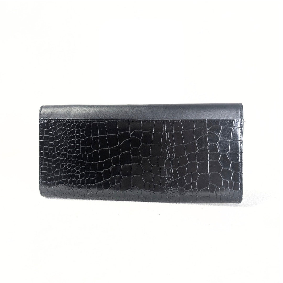 The back side of the Ted Baker Crocodile Embossed Leather Envelope Evening Clutch Bag, captured on the white background. 