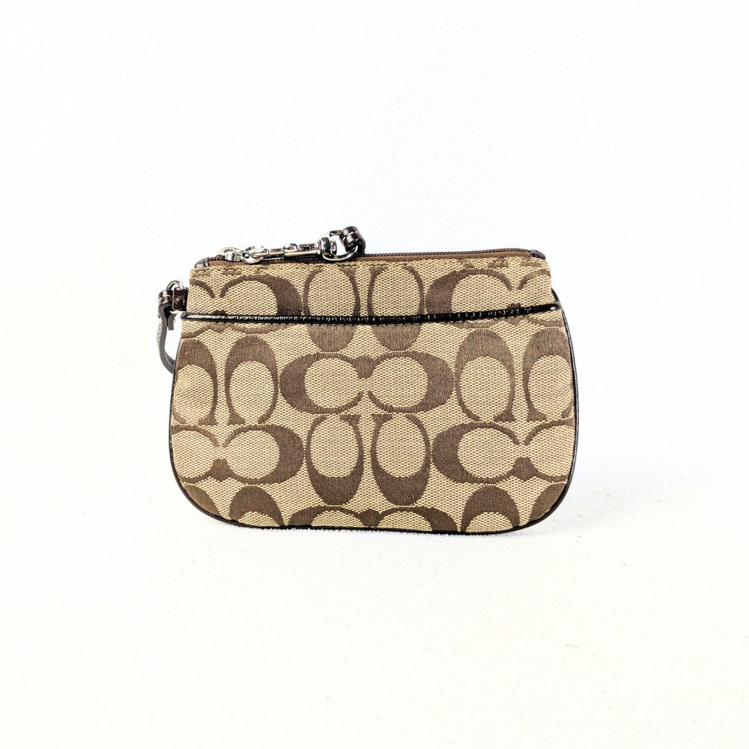 COACH Signature Canvas Wristlet – Beige & Brown